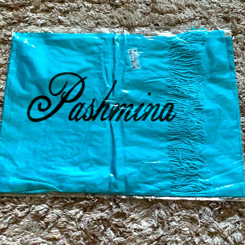 Brand new pashmina scarf. Great doe gifts. Ocean blue color